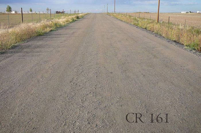 Cr 161 is written on the side of a dirt road