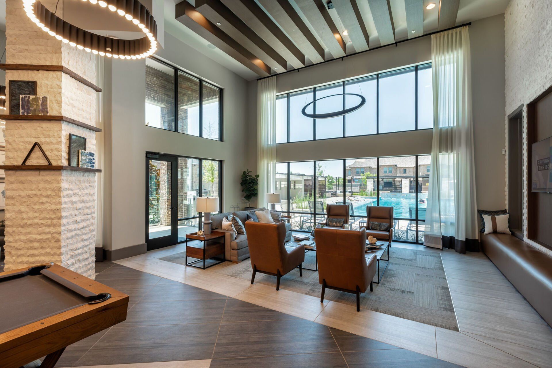 Resident Lounge with Pool View | Domain at Founders Parc