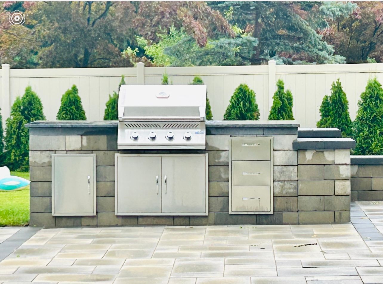 there is a pizza oven in the middle of the kitchen .