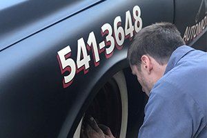 Truck Repairs — Mechanic Change Car Tire in West Allis, WI