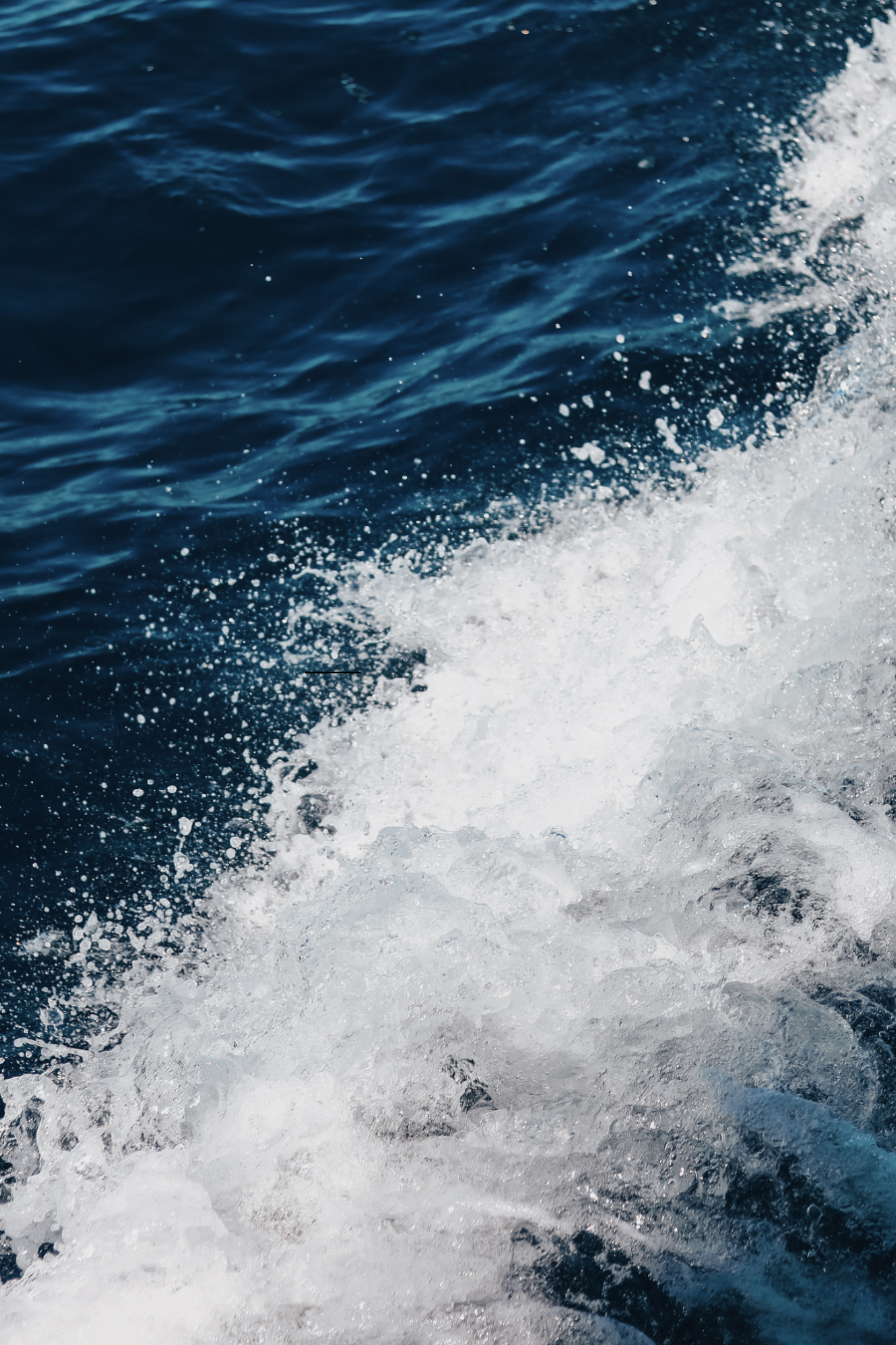 Rough blue waters of the Aegean Sea during open-sea conditions.