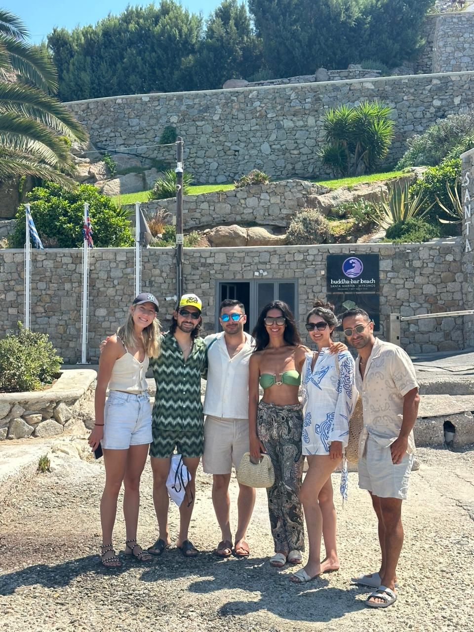 Aegean Yachting Charters host with guests in Ornos, Mykonos, before boarding a private or semi private yacht cruise