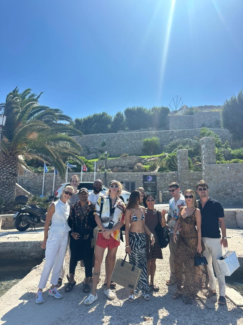 Aegean Yachting Charters host with guests at Ornos marina, Mykonos, before embarkation on a yacht cruise