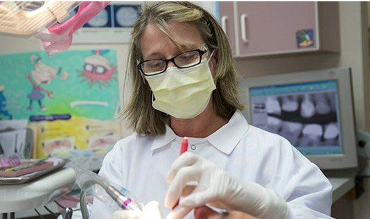 Woman Cleaning Teeth — Dental Care in Yorktown Heights, NY