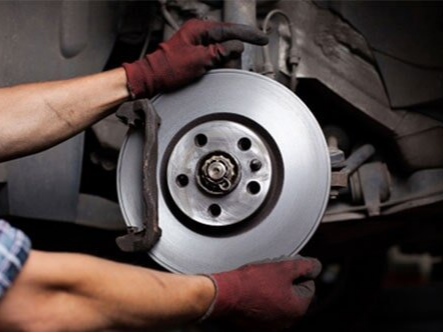 Car Mechanic Repairing Brakes - Auto Repair Shop in Biddeford, ME
