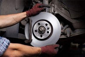 Car Mechanic Repairing Brakes - Auto Repair Shop in Biddeford, ME