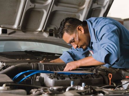 Mechanic Fixing Engine - Auto Repair Shop in Biddeford, ME