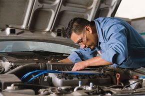 Mechanic Fixing Engine - Auto Repair Shop in Biddeford, ME