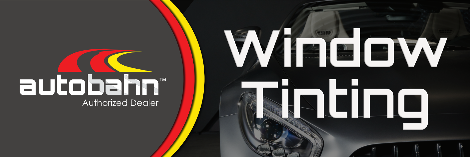 A blue sports car is parked in a parking lot.