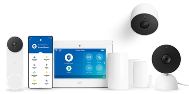 A phone a tablet a doorbell and a smoke detector are laying on a white surface. A phone a tablet a doorbell and a smoke detector are laying on a white surface.