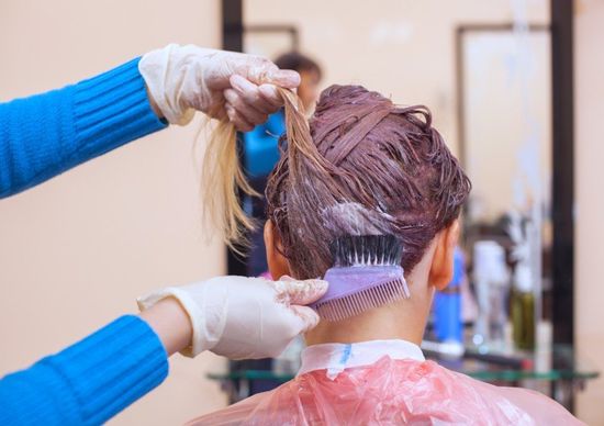 man getting his hair colored