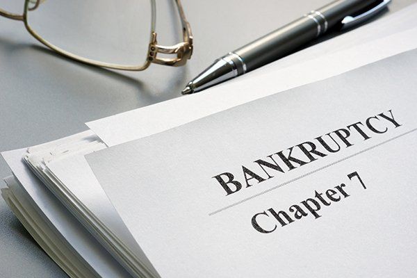 Chapter 7 Bankruptcy Petition and Glasses — Fort Walton Beach, FL — Tracy O. Strom, PA