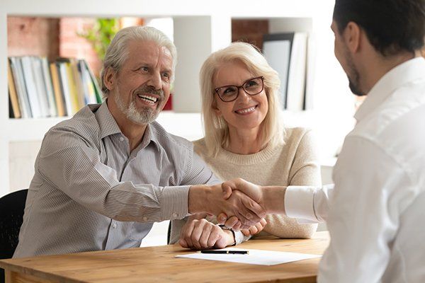 Happy Old Couple Meeting with Lawyer — Fort Walton Beach, FL — Tracy O. Strom, PA