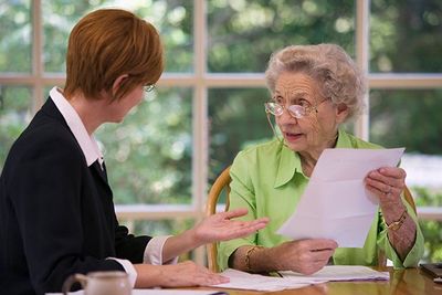 Senior Woman Meeting with Lawyer — Fort Walton Beach, FL — Tracy O. Strom, PA