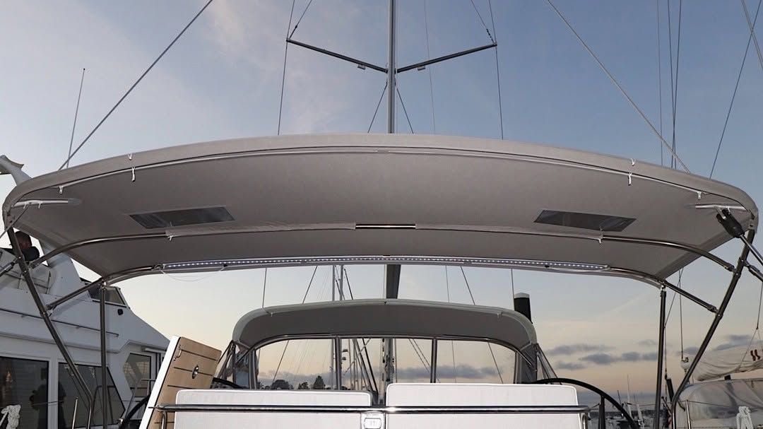 A sailboat with a canopy on top of it.