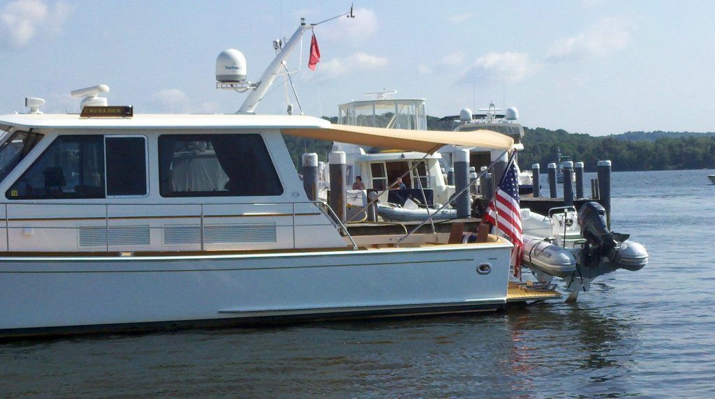 A boat with an american flag on the side of it