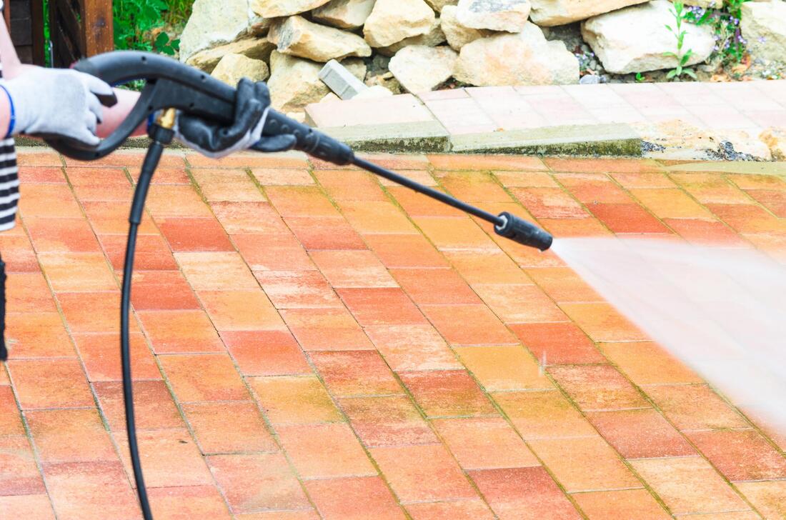 High pressure cleaning of pavers