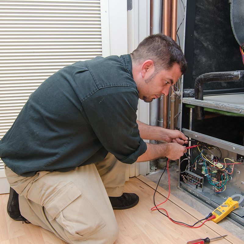 Expert Checking The Residential Heat Pump