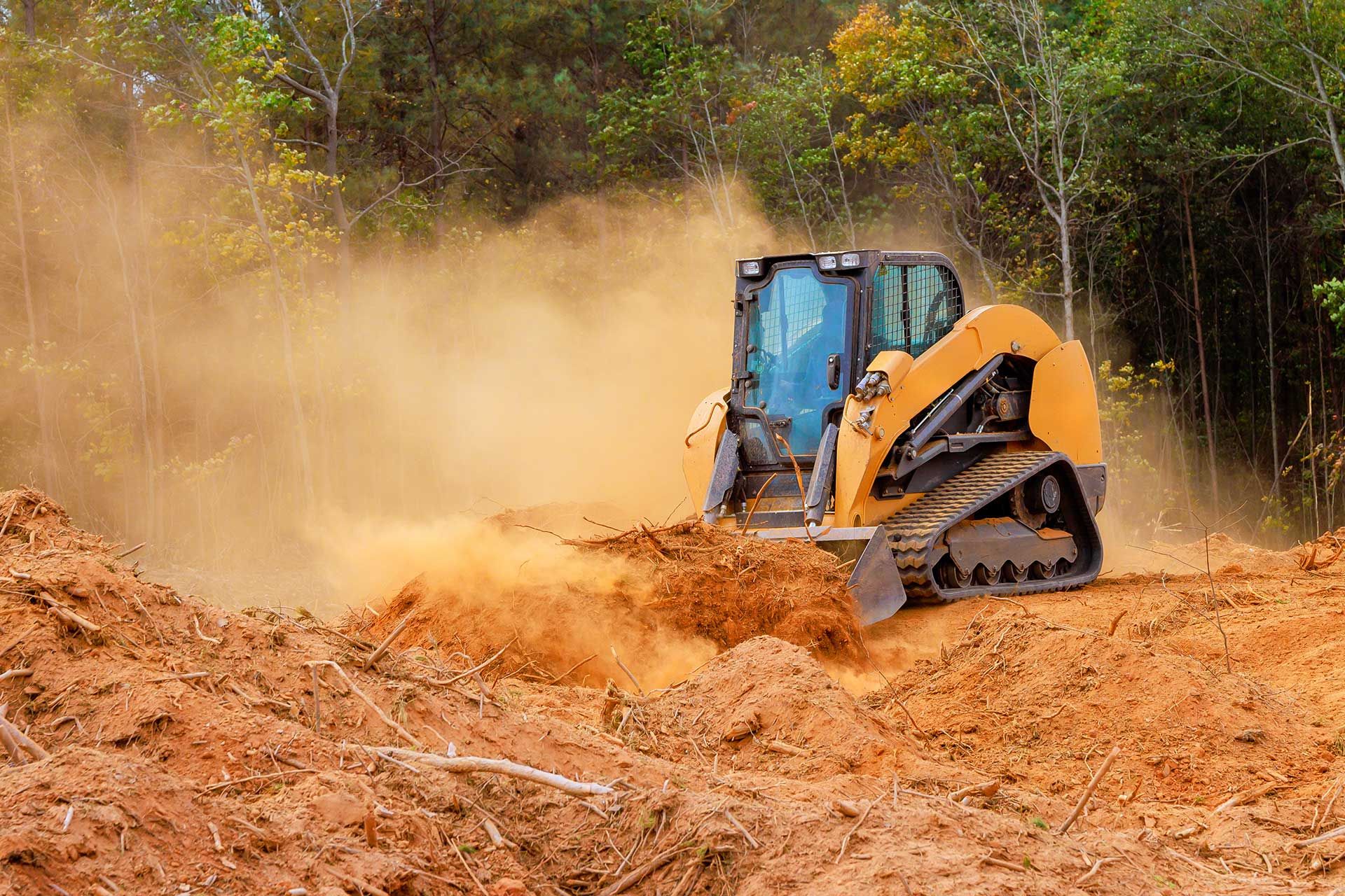 
Powerful bulldozer clears soil