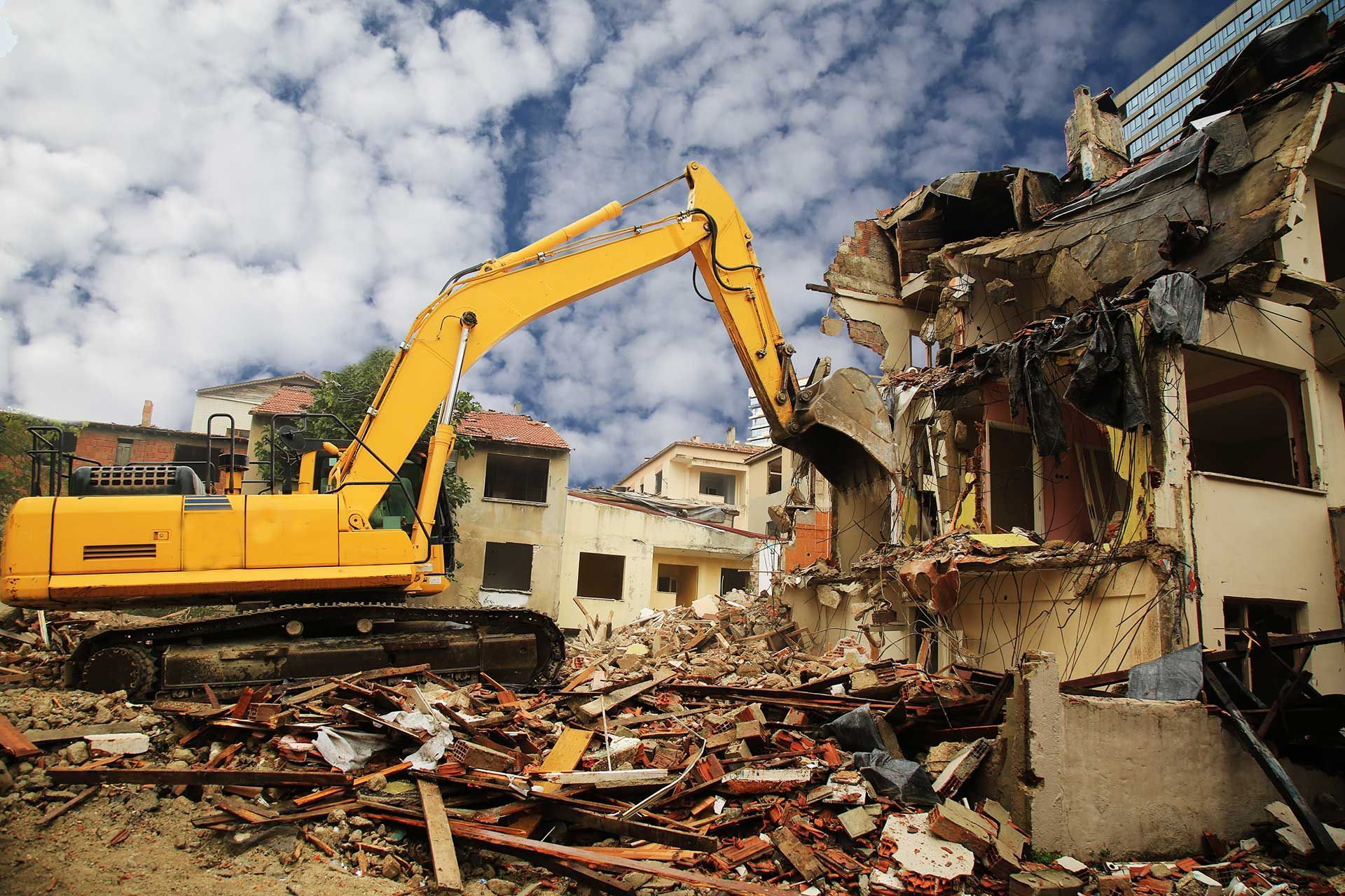 Excavators working on huge demolition site