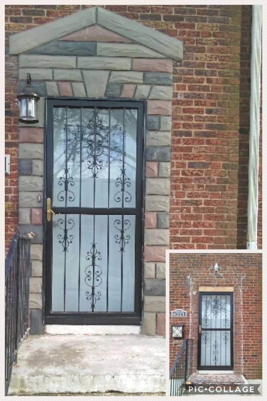 A brick house entrance with a security door, stone trim, and a small inset image of the doorway.