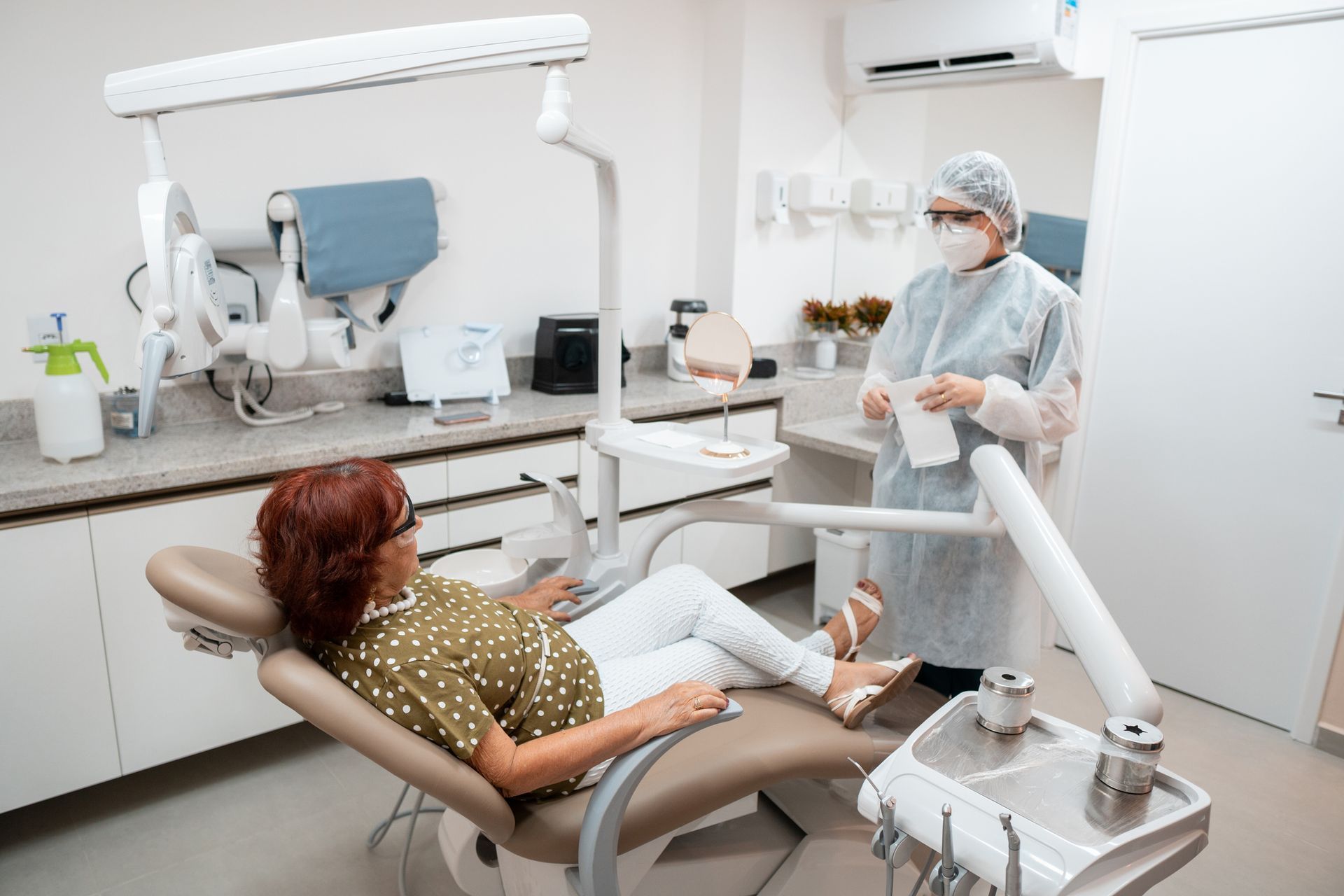 A patient sits in the first chair at Osage Dental Associates, a general dentist office in Blaine, MN