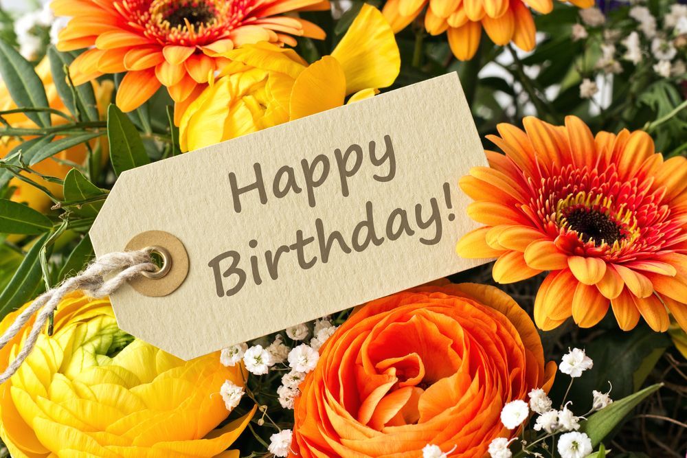 A Bouquet of Flowers With a Happy Birthday Tag — Suncoast Flowers in Buderim, QLD