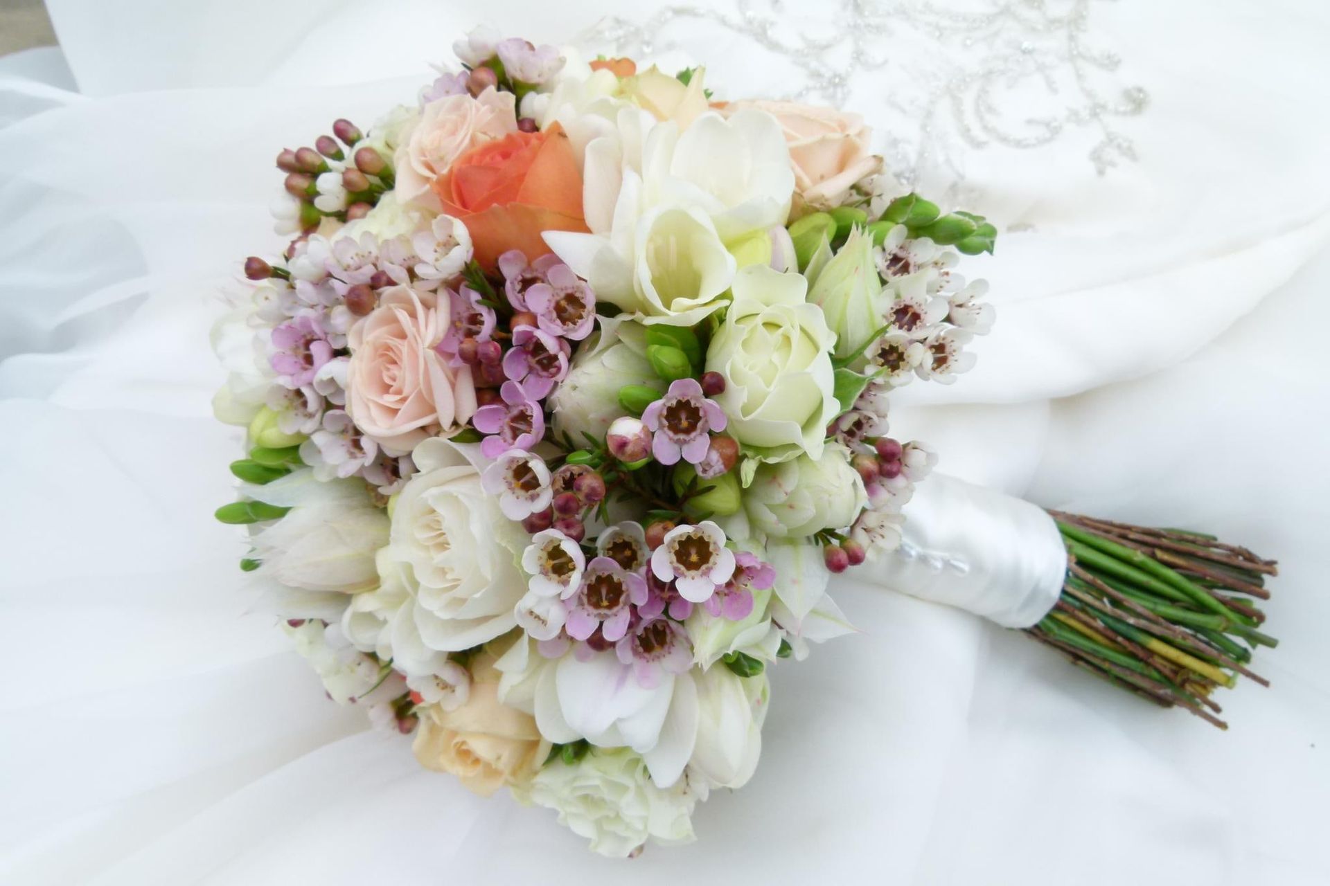 A Bouquet of Flowers is Sitting on a White Cloth — Suncoast Flowers in Maroochydore, QLD