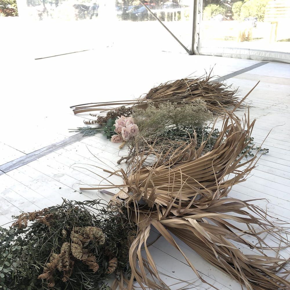A Bunch of Dried Flowers Are Laying on the Ground — Suncoast Flowers in Caloundra, QLD