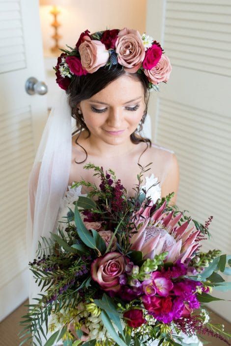 The Bride is Wearing a Flower Crown and Holding a Bouquet of Flowers — Suncoast Flowers in Birtinya, QLD