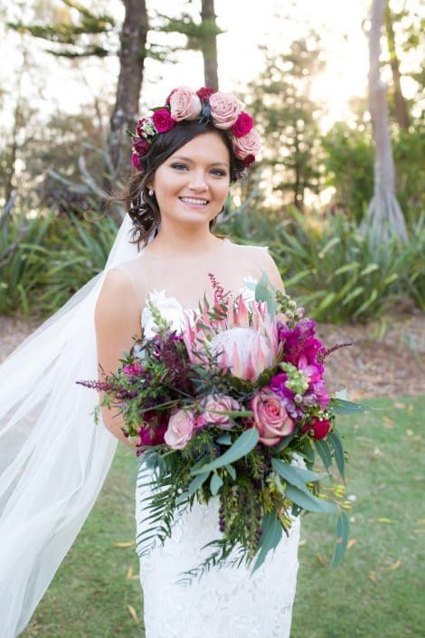 The Bride is Wearing a Flower Crown and Holding a Bouquet of Flowers — Suncoast Flowers in Birtinya, QLD