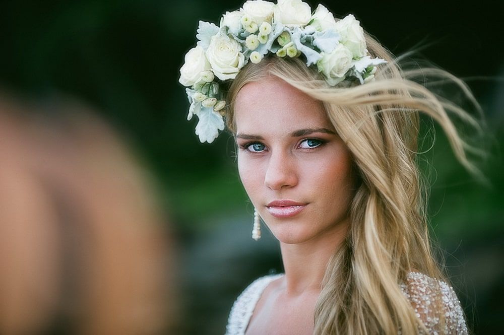 A Woman With a Flower Crown on Her Head is Looking at the Camera — Suncoast Flowers in Birtinya, QLD