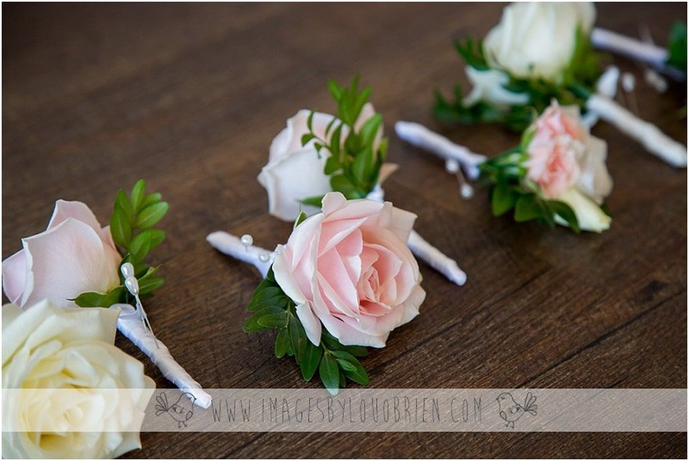 A Bunch of Flowers Are Sitting on a Wooden Table — Suncoast Flowers in Birtinya, QLD