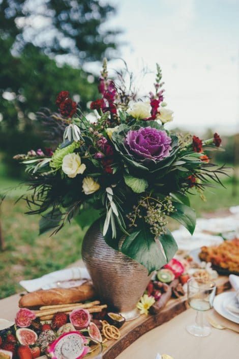 A Vase Filled With Flowers is Sitting on a Table — Suncoast Flowers in Birtinya, QLD