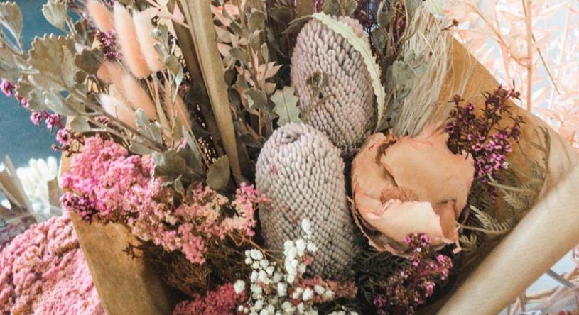 A Close Up of a Bouquet of Dried Flowers on a Table — Suncoast Flowers in Birtinya, QLD