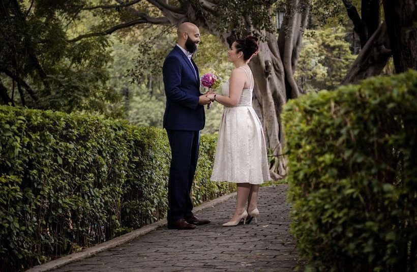 A Bride and Groom Are Standing Next to Each Other — Suncoast Flowers in Maroochydore, QLD