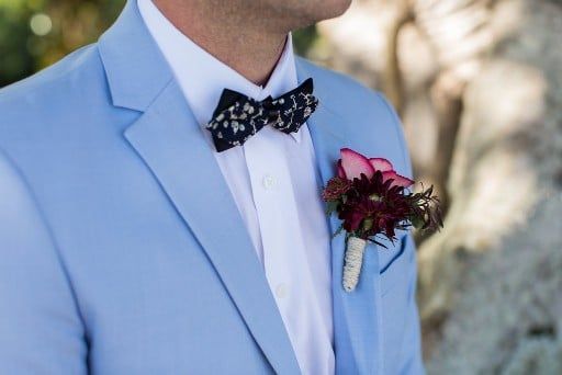 The Groom is Wearing a Light Blue Suit and a Bow Tie — Suncoast Flowers in Birtinya, QLD