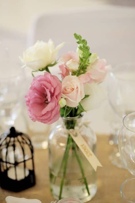 A Vase Filled With Pink and White Flowers Has a Name Tag That Says Peace — Suncoast Flowers in Birtinya, QLD