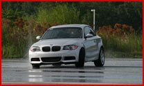 Automotive  — BMW Driving In A Wet Road In JAcksonville, FL
