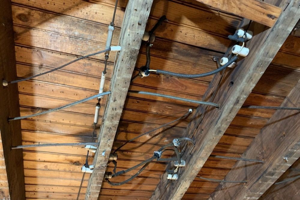 Lit-up blue hot tub with bubbles and jets; interior setting.