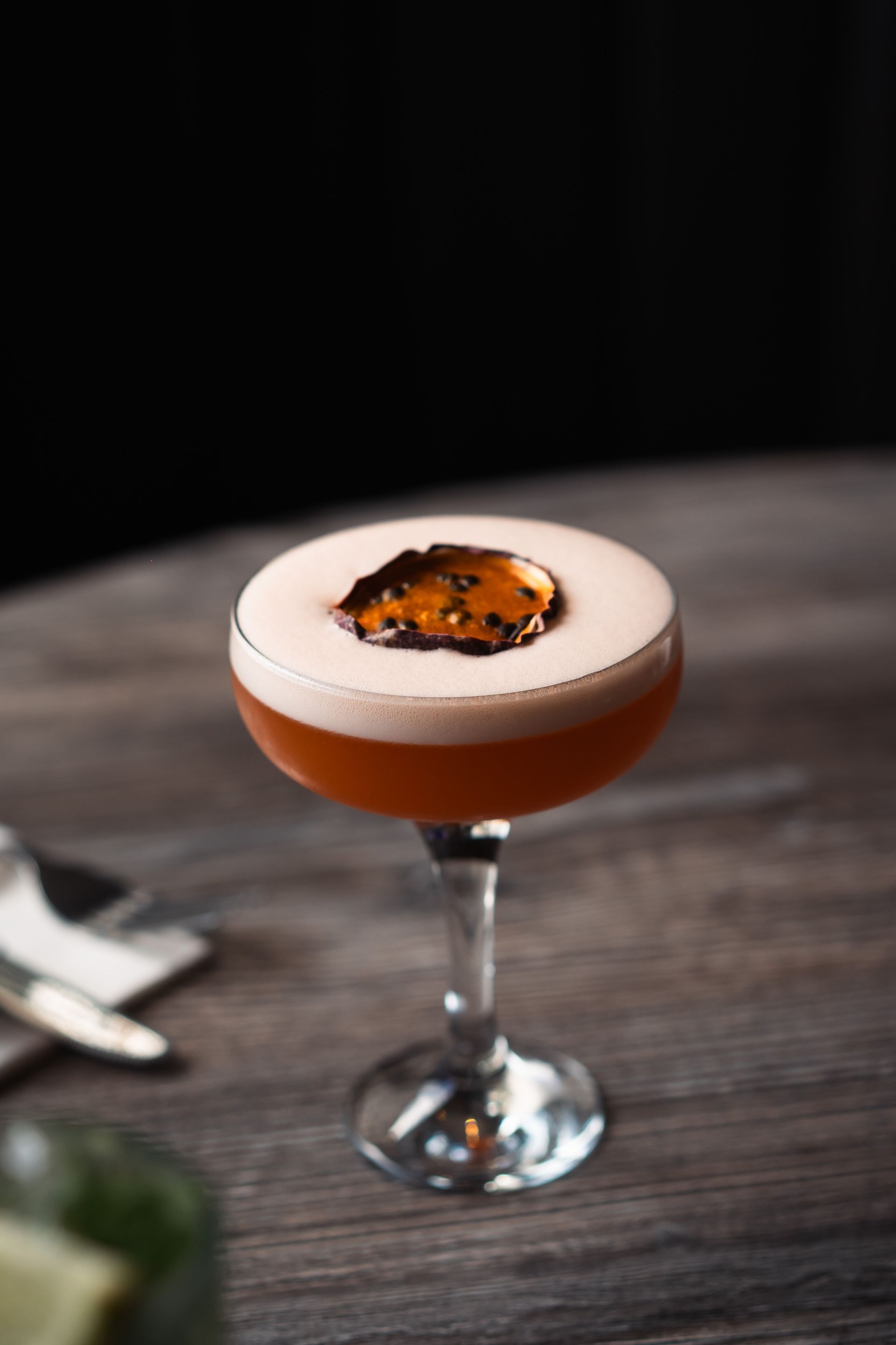 A group of women are posing for a picture in a club.