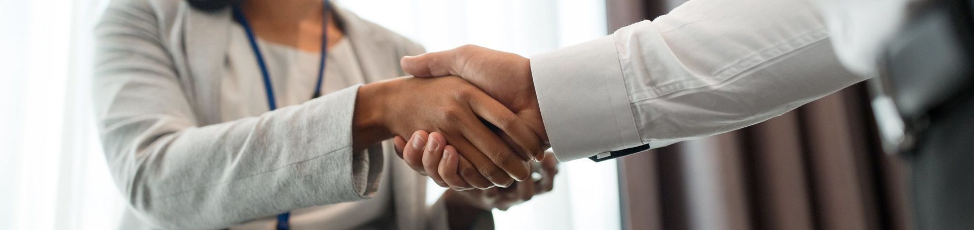 handshake of people at business conference handshake of people at business conference