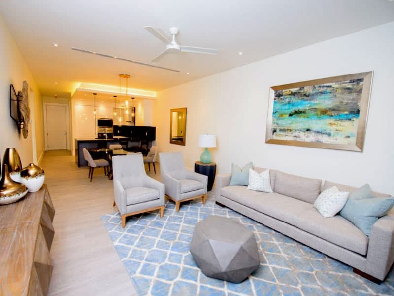 Spacious kitchen featuring island workspace in One Cable Beach condo in Nassau, Bahamas