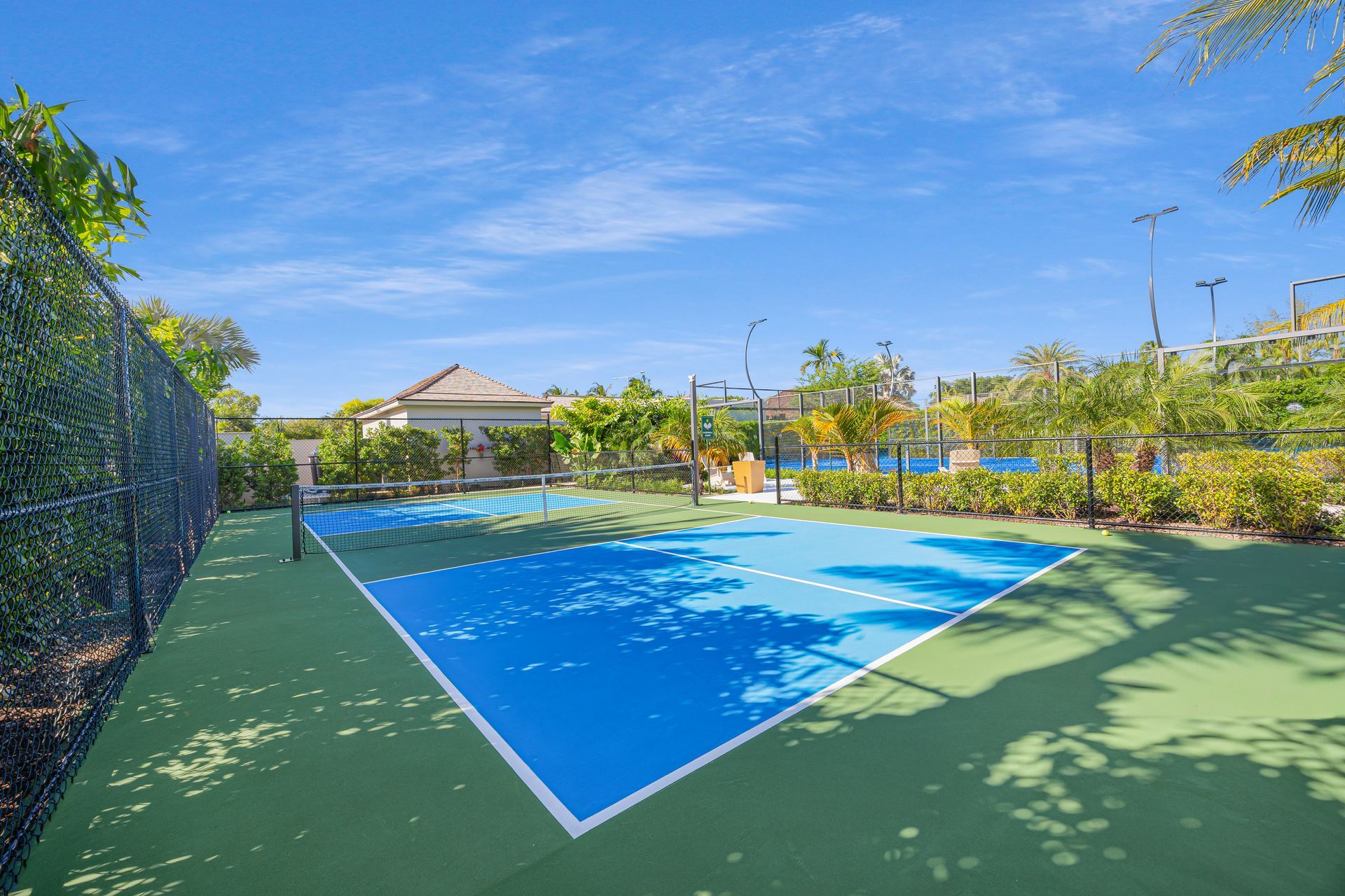 Beachfront lounge chairs for guests at Aqualina luxury condo in Nassau, The Bahamas