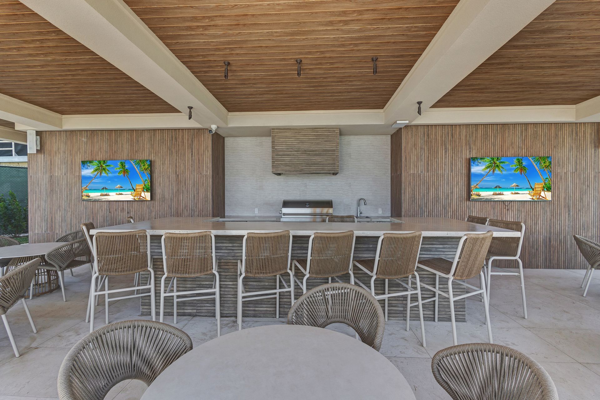 Oceanfront seating area at Aqualina beachfront property in The Bahamas
