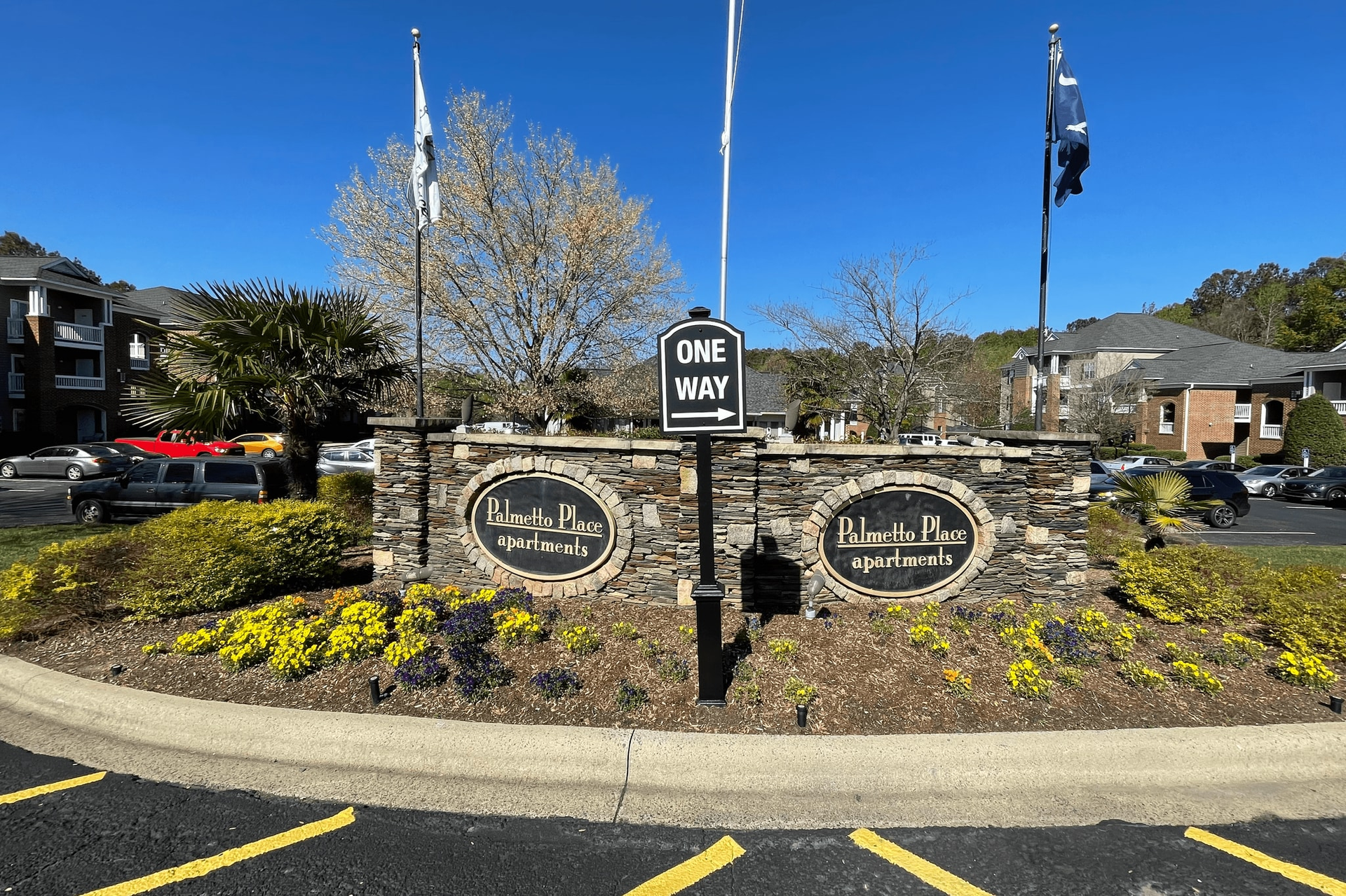 Stone entrance sign for an apartment complex with