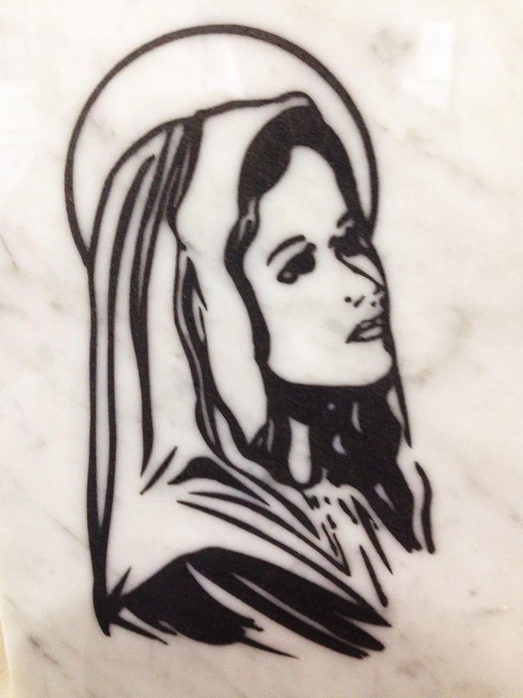 madonna in rilievo su pietra