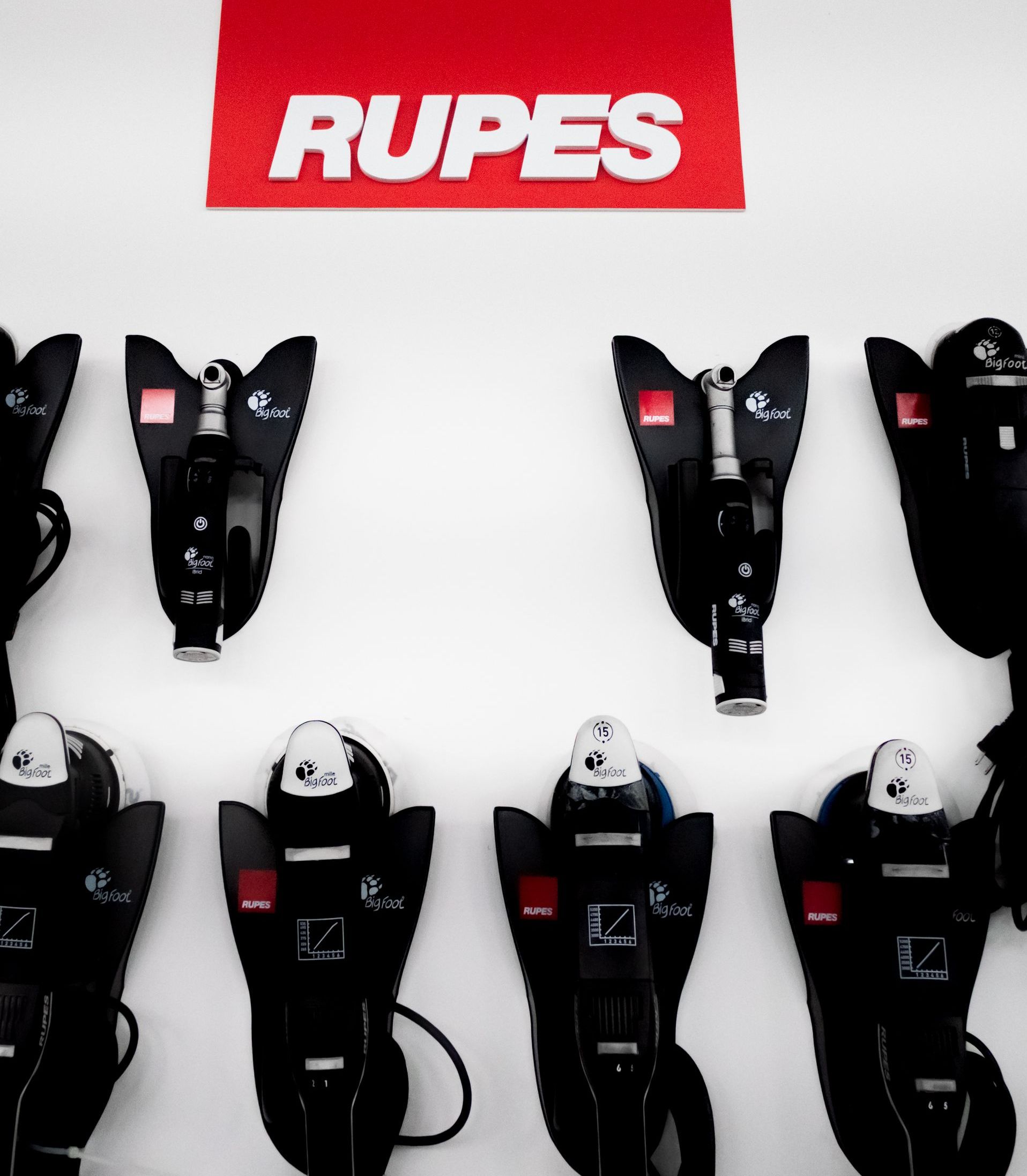 A row of rupes products are displayed on a wall