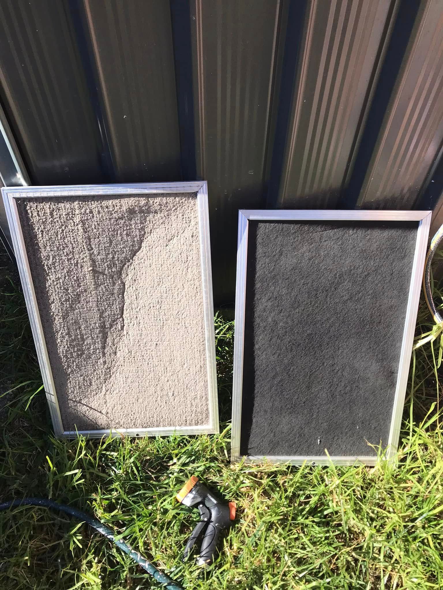 A Two Air Filters, One Light, One Dark, in Metal Frames — Escarpment Air in Mount Saint Thomas, NSW