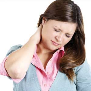A woman suffering neck pain